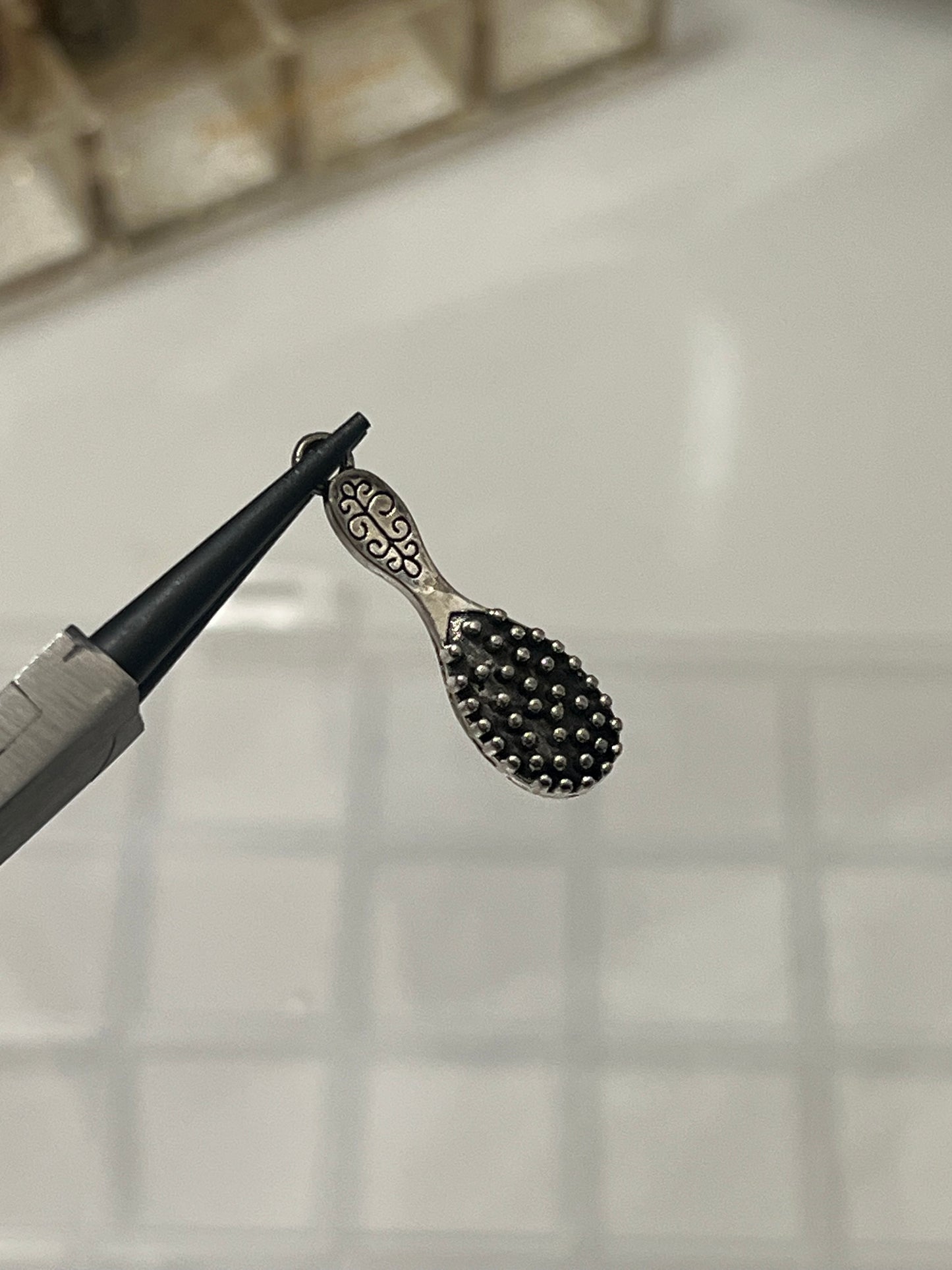 Hair brush charm