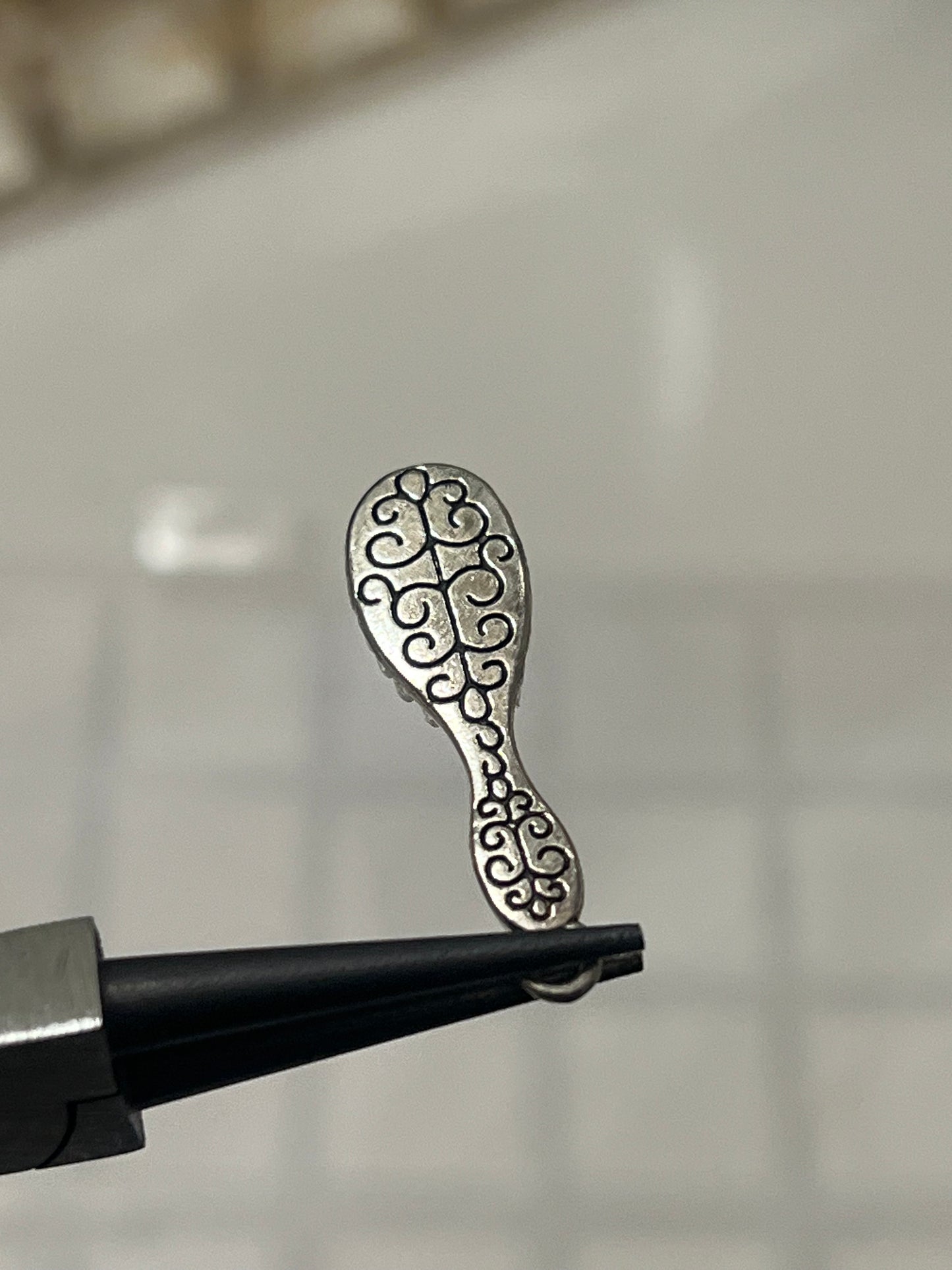 Hair brush charm