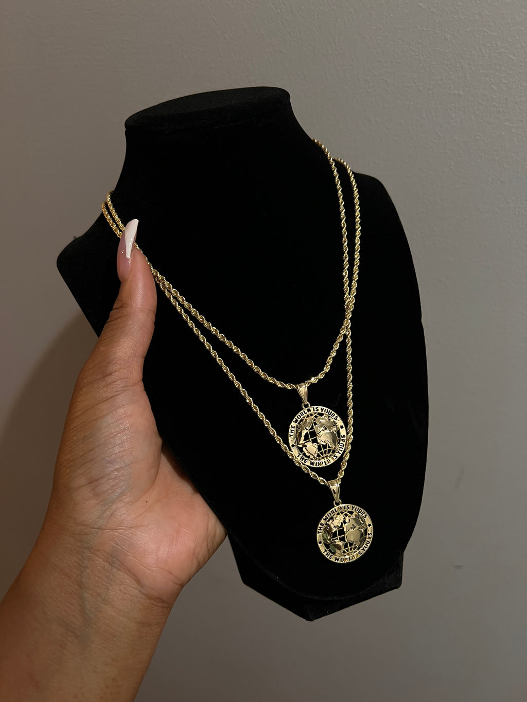 The Wrld is yours pendant necklace